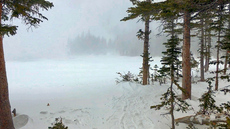Stepping closer to a blizzard on the frozen Crater Lakes, James Peak Wilderness, Colorado. January, 2018.